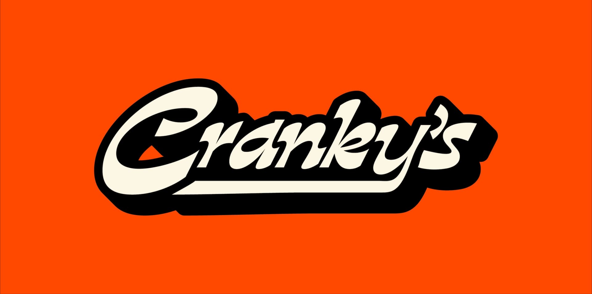 Cranky's script wordmark in cream on orange