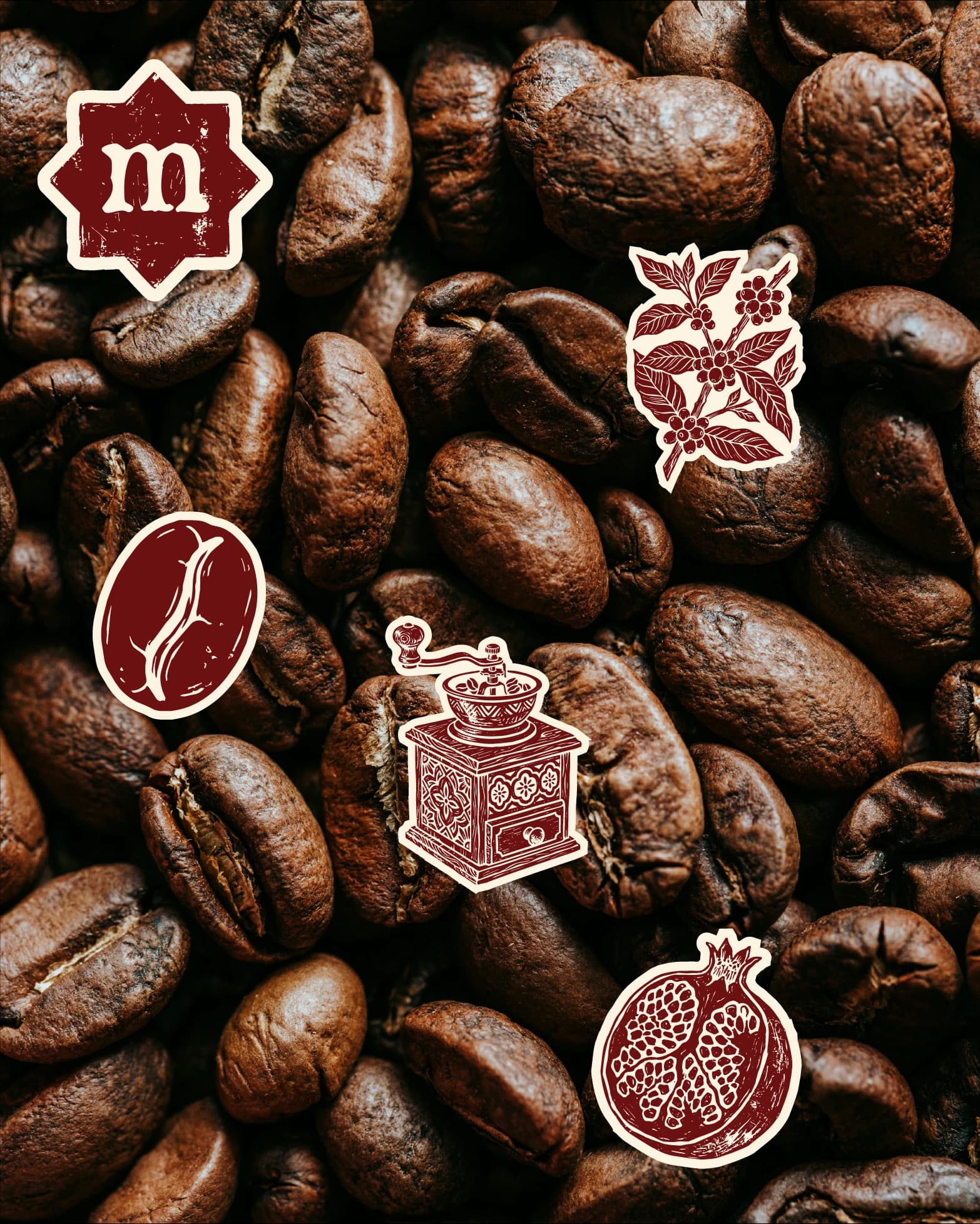 Mukka stickers on coffee beans: the m badge, a bean, a grinder and a pomegranate