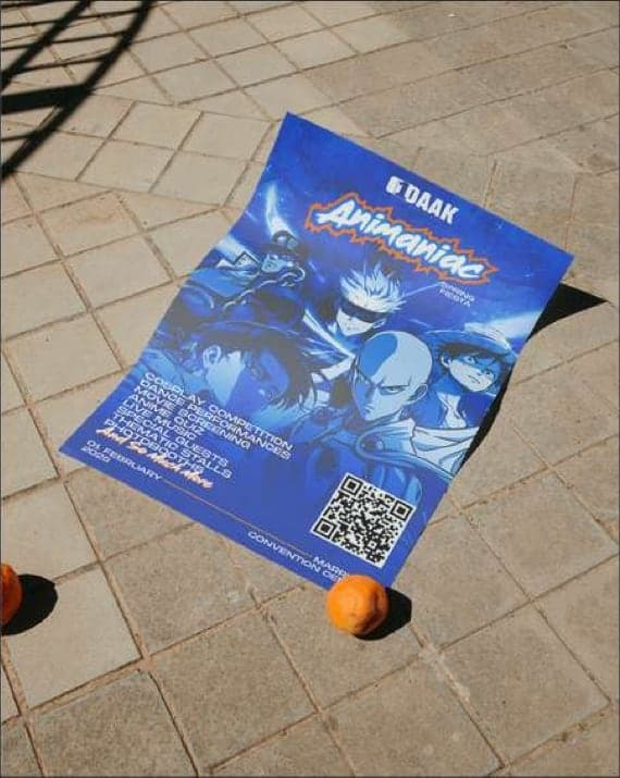 Printed poster with a QR code on paving stones